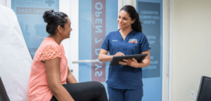 Doctor smiling at patient